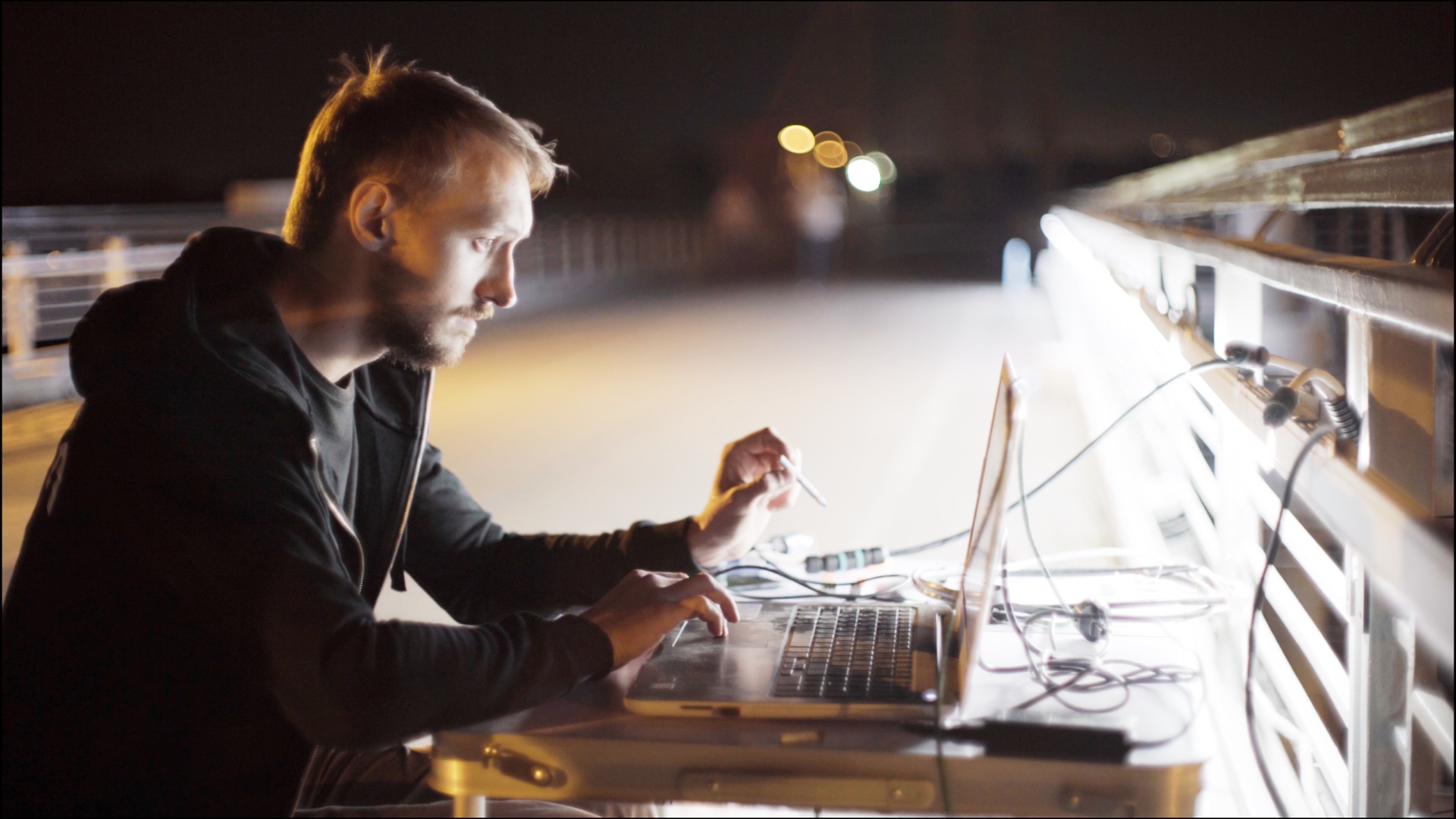 Technician programming a light installation